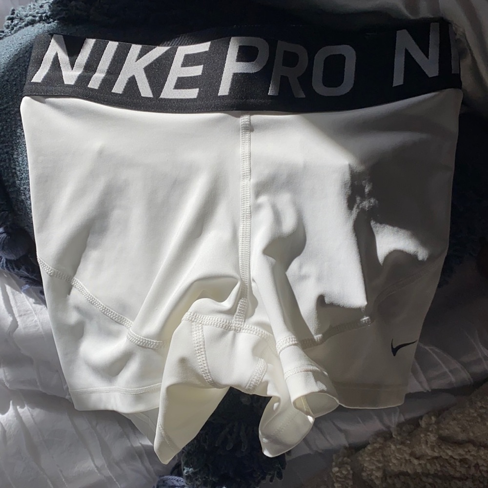 white nike pros